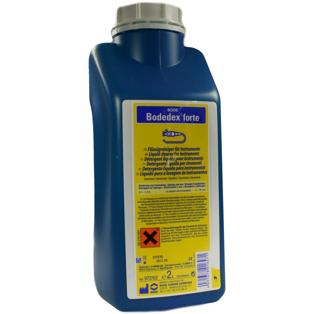 Eine blaue Flasche mit einer gelben Etikett über Reinigungsmittel für Instrumente.