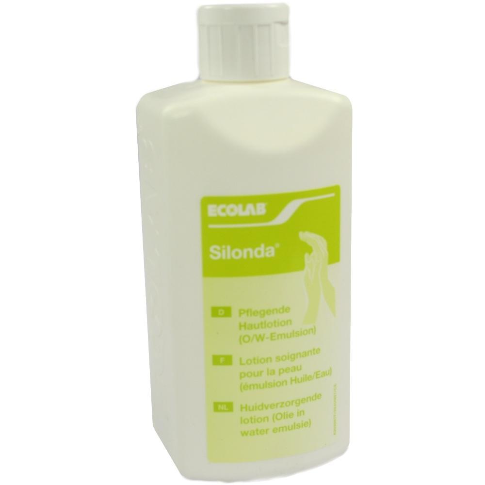 Eine wei&szlig;e Flasche mit einer gr&uuml;nen Aufschrift enth&auml;lt eine pflegende Hautlotion.