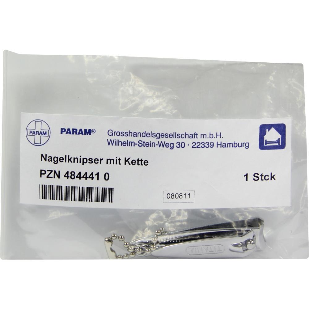 Eine Verpackung mit einem silbernen Nagelknipser und einer Kette.