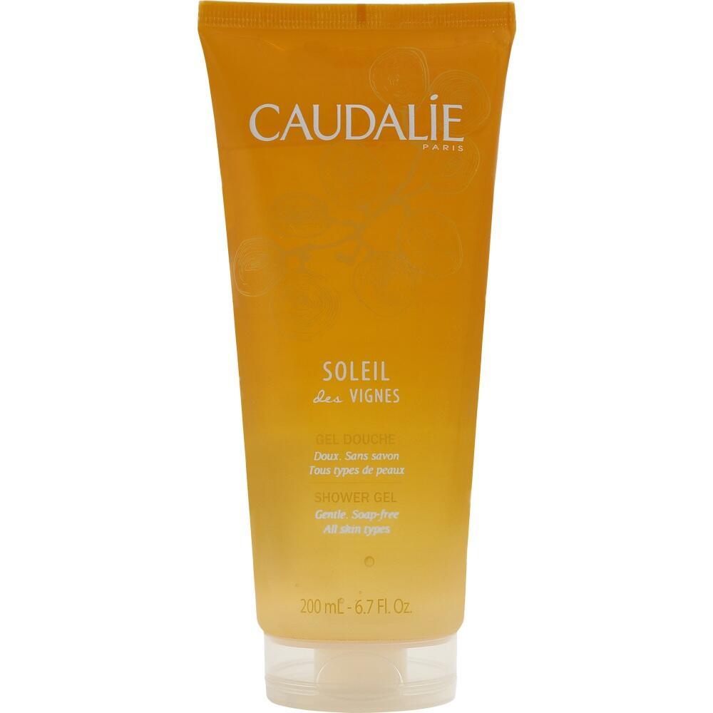 Eine orangefarbene Tube mit Duschgel der Marke Caudalie.