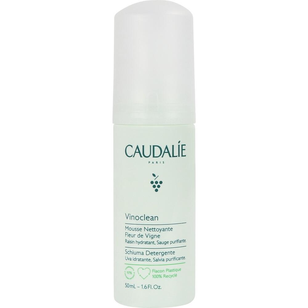 Eine Flasche mit Schaumreiniger von Caudalie mit grünem Etikett und weißem Deckel.