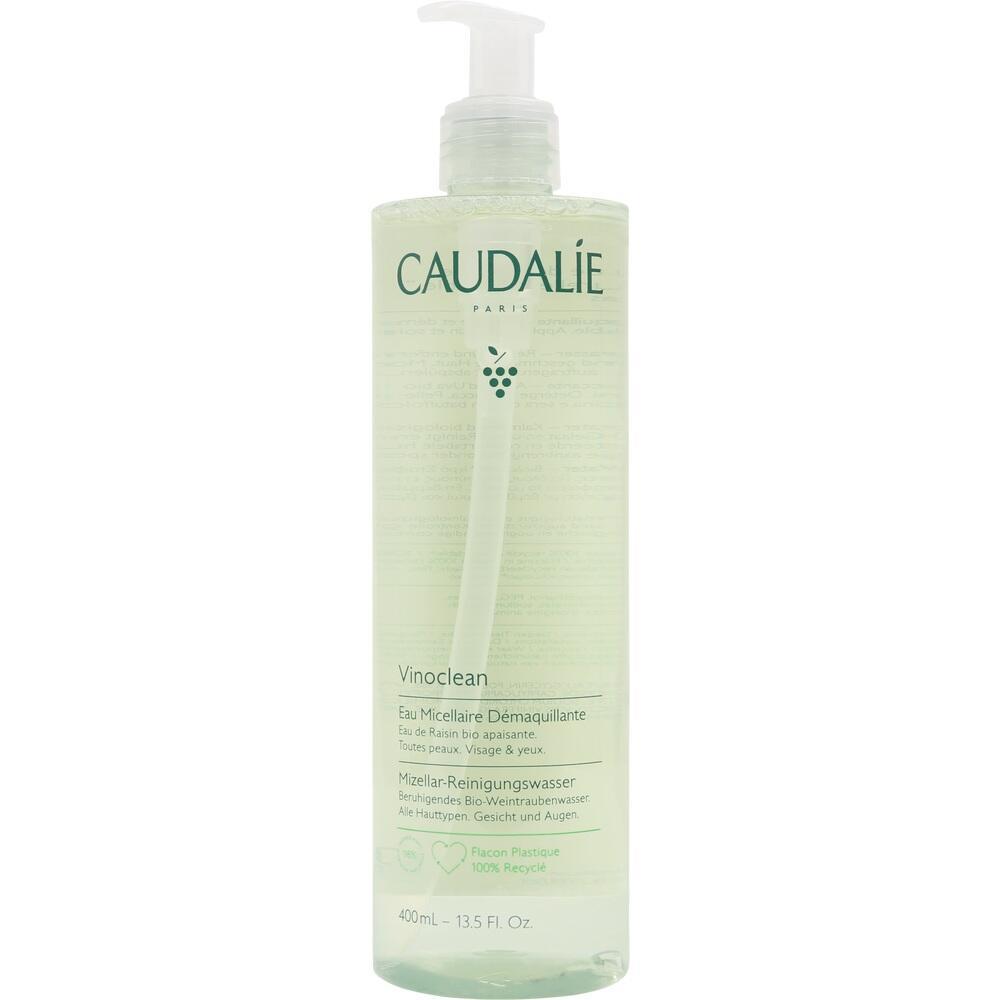 Eine grüne Flasche mit Pumpspender von Caudalie, beschriftet als Mizellen-Reinigungswasser.