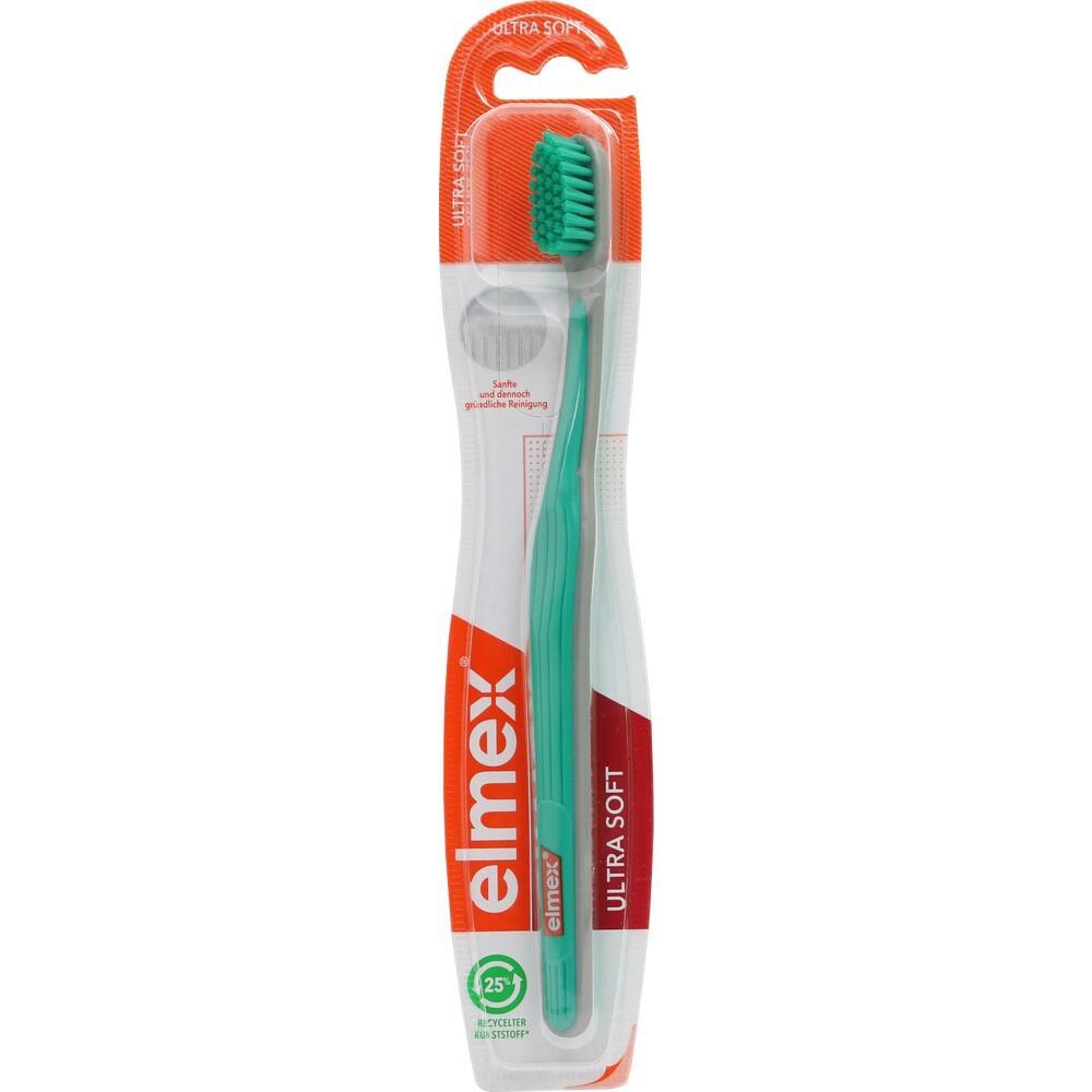 Eine verpackte, grüne Zahnbürste der Marke elmex.