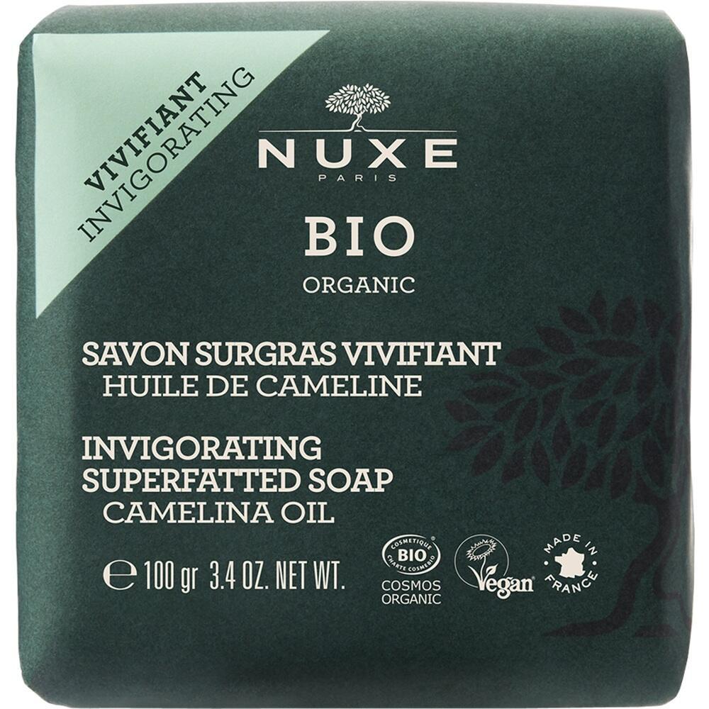 Gr&uuml;nes Etikett einer Seife mit Bio-Zertifizierung und veganen Symbolen.
