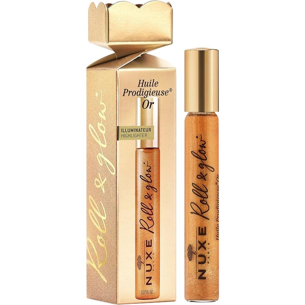 Roll-On-Flasche mit goldenem Highlighter-&Ouml;l neben einer goldenen Verpackung.